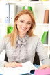 Portrait of teacher woman working in classroom