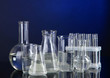 Photo: Test tubes on blue-black background Test tubes on blue-black background