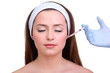 Photo: Young woman receiving plastic surgery injection Young woman receiving plastic surgery injection