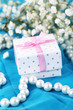 Flowers  and gift  on blue cloth