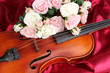 Classical violin on fabric background