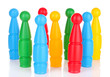 Colorful plastic skittles of toy bowling isolated on white