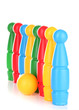 Photo: Colorful plastic skittles of toy bowling isolated on white Colorful plastic skittles of toy bowling isolated on white