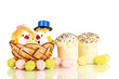 Easter eggs and two chicken toys isolated on white
