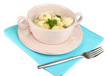 Tender young potatoes with sour cream and herbs in pan isolated