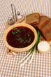 Delicious borsch on table close-up