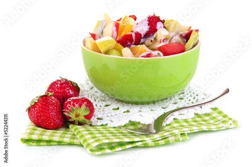 Photo: Useful fruit salad of fresh fruits and berries in bowl isolated Useful fruit salad of fresh fruits and berries in bowl isolated