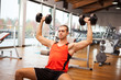 Man lifting dumbbells