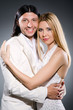 Pair in love in dark studio