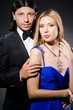Pair in love in dark studio