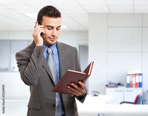 Photo: Busy executive portrait Busy executive portrait