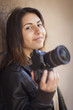 Photo: Mixed Race Young Adult Female Photographer Holding Camera Mixed Race Young Adult Female Photographer Holding Camera