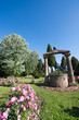 Pit in the middle of a beautiful rose garden