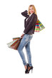 Young woman with bags after shopping
