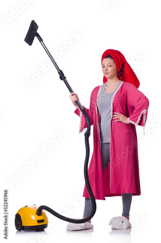 Photo: Woman working with vacuum cleaner on white Woman working with vacuum cleaner on white