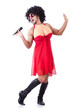 Man in female clothing singing with mic
