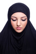 Muslim young woman wearing hijab on white