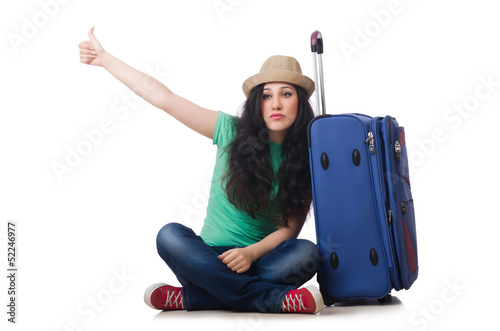 Photo: Young woman with suitcase isolated on white Young woman with suitcase isolated on white