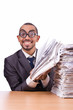 Busy businessman with lots of papers