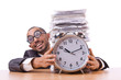 Woman businesswoman with giant alarm clock