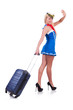 Woman travel attendant with suitcase on white