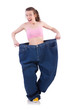 Foto: Woman in dieting concept with big jeans Woman in dieting concept with big jeans