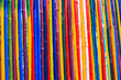 Abstract texture of dyed bamboo sticks.