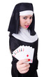 Nun playing cards on white