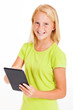 pre teen girl using tablet computer
