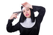 Photo: Nun with gun isolated on the white Nun with gun isolated on the white
