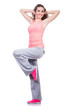 Young Female Doing Exercises O...