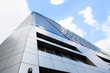 blue sky reflected in modern building mirror glass wall