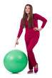 Young woman with ball exercising on white