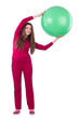 Young woman with ball exercising on white