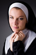 Young nun in religious concept