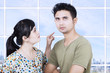 Girlfriend angry at boyfriend in apartment