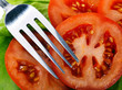 Photo: Tomato slices with fork Tomato slices with fork