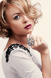 portrait of a beautiful girl with a pearl ring