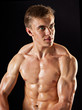 young bodybuilder demonstrates posture