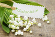 canvas print picture - Maiglöckchen mit Schild "Gutschein"