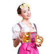 Foto: attraktive junge Frau im Dirndl mit Bierkrug und Brezel attraktive junge Frau im Dirndl mit Bierkrug und Brezel