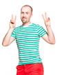 Portrait of a young cheerful man with v sign isolated on white