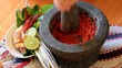 Pounding ingredients.