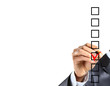 Hand choosing one of three options