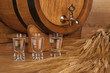 glass of vodka and barrel