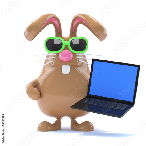 Illustration: Chocolate bunny loves his new laptop Chocolate bunny loves his new laptop