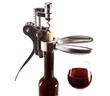 bottle with an opener  and a wine glass