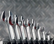 Set of brilliant nut keys of different sizes on support..