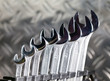 Photo: Set of brilliant nut keys of different sizes on support.. Set of brilliant nut keys of different sizes on support..