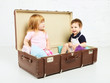 Boy and Girl in Suitcase
